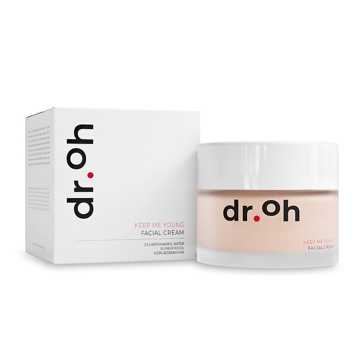 Glasdose mit weißem Deckel und Aufschrift 'dr. oh' neben passender weißer Verpackung mit gleicher Aufschrift